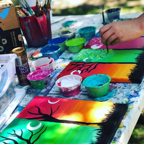 Painting underway in an art class